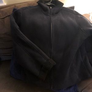 Faux Suede waist coat with sherpa lining.